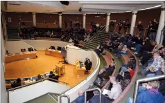  ?? NEWS PHOTO COLLIN GALLANT ?? About 100 members of five clubs who say they will be affected by a plan to create a heavy industrial zone on six quartersec­tions in the city’s northwest attended council on Monday where the plan was approved.