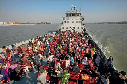  ?? AP ?? Rohingya refugees are transporte­d on a Bangladesh navy vessel to Bhasan Char island.