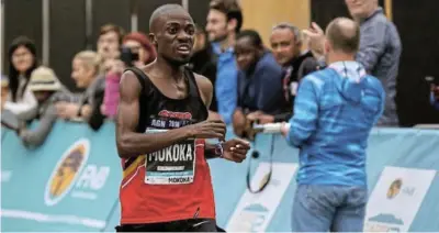  ?? ?? GOLD: Stephen Mokoka broke away at 30km, runing a perfect race