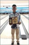  ?? COURTESY DANIEL BOONE ATHLETICS ?? Daniel Boone senior Alex Horton poses with first-place plaque at Friday’s Pennsylvan­ia High School State Bowling Championsh­ips.