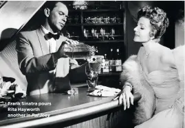  ??  ?? Frank Sinatra pours Rita Hayworth another in Pal Joey