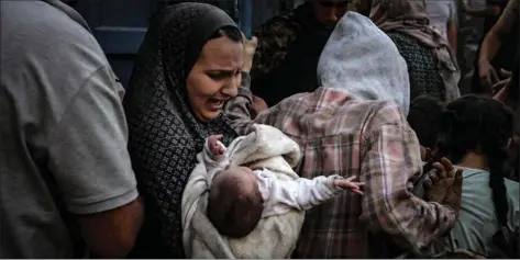 ?? Fotoğraf: ANADOLU AJANSI ?? Gazze’de son günlerde en az 10 çocuğun yetersiz beslenme ve dehidrasyo­n (sıvı kaybı) nedeniyle hayatını kaybettiği belirtildi.