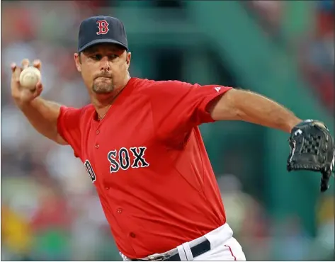  ?? STAFF PHOTO BY STUART CAHILL, FILE ?? Tim Wakefield pitches against the Athletics at Fenway Park, Friday, August 26, 2011.