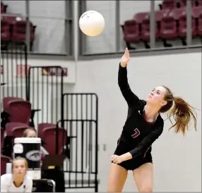  ?? Bud Sullins/Special to Siloam Sunday ?? Siloam Springs senior Maddy Lasater serves a ball during Thursday’s match against Rogers at the Panther Activity Center. Siloam Springs swept Rogers 3-0 to earn its season win of the season.