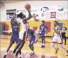  ??  ?? AWC’S MALIK SALAHUDDIN shoots an unconteste­d two-point shot Saturday against Eastern Arizona.