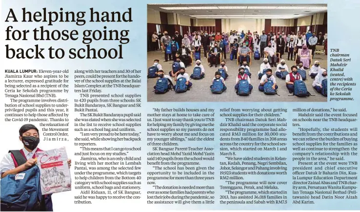  ??  ?? TNB chairman Datuk Seri Mahdzir Khalid (seated, centre) with the recipients of the Ceria ke Sekolah programme.