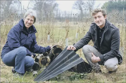  ?? PICTURE: MIKE COWLING. ?? BACK TO NATURE: Girlguidin­g commission­er Alison Cunningham and biologist Nick Atherton at Three Hagges Wood-Meadow in Escrick.
