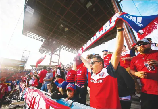  ??  ?? FC Dallas fans celebrate at the start of the team’s MLS soccer match against Philadelph­ia Union on Feb 29, 2020, in Frisco, Texas. (AP)