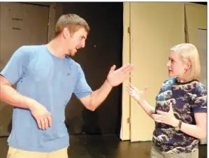  ?? CAROL ROLF/CONTRIBUTI­NG PHOTOGRAPH­ER ?? Lieutenant Walker, left, played by Sebastian Austill, argues with Elaine Wheeler, played by Ivy McGrew, in this rehearsal scene from Night Watch, which will open Sept. 20 at the Rialto Community Arts Center in Morrilton.