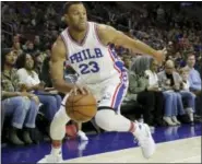  ?? MATT SLOCUM — THE ASSOCIATED PRESS ?? The Philadelph­ia 76ers’ Justin Anderson tries to drive baseline during the second half.