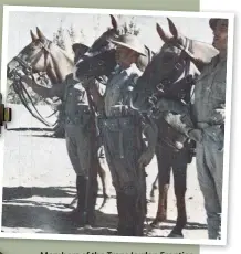  ??  ?? Members of the Trans Jordan Frontier Force display the cartridge carriers of their 1940 Pattern webbing set