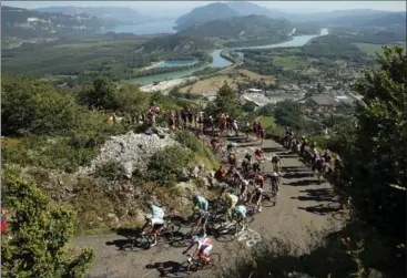  ?? CHRIS GRAYTHEN, GETTY IMAGES ?? Team Sky’s Christophe­r Froome of Great Britain led his group across the finish on the Lacets du Grand Colombier.