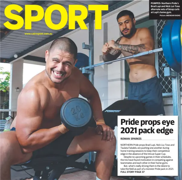  ?? Picture: BRENDAN RADKE ?? www.cairnspost.com.au
PUMPED: Northern Pride’s Brad Lupi and Nick Lui-Toso alternate sets of bicep curls at Lupi’s home gym.