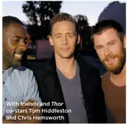  ??  ?? With friends and Thor co-stars Tom Hiddleston and Chris Hemsworth