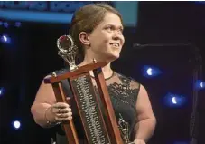  ?? PHOTO: KEVIN FARMER ?? WINNER: Paralympia­n Claire Keefer celebrates being named 2016 Sports Darling Downs Senior Sport Star of the Year at the Sports Darling Downs awards night earlier this year.