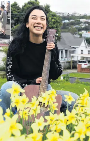  ?? PHOTO: STEPHEN JAQUIERY ?? Tickled Pink . . . busker Deina SusiloKnox, who got $20 from Pink while busking at the Otago Farmers Market on Saturday.