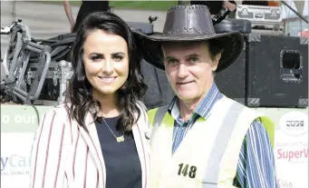  ??  ?? Country Singer Lisa McHugh and Gerry Ryan, Tubbercurr­y’s long distance walker for various charities. Pic: Tom Callanan.