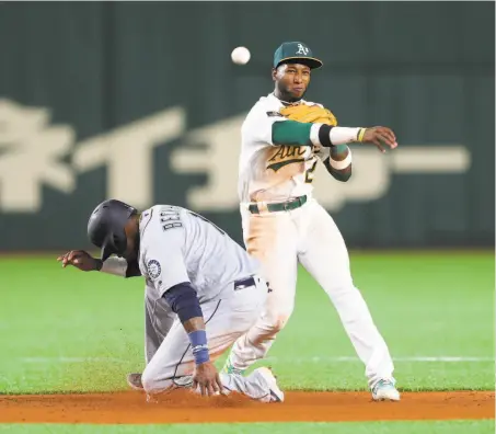  ?? Alex Trautwig / MLB Photos via Getty Images ?? A’s second baseman Jurickson Profar has committed seven errors this season, six of them coming on throws.