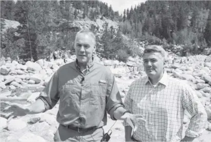  ?? Andy Colwell, Special to The Denver Post ?? U.S. Secretary of the Interior Ryan Zinke, left, and U.S. Sen. Cory Gardner of Colorado meet with the media Saturday after a news conference at Rocky Mountain National Park’s Alluvial Fan Trail area.