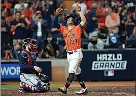  ?? DAVID J. PHILLIP / AP ?? Houston Astros’ Jose Altuve celebrates after a home run during the seventh inning in Game 2 of baseball’s World Series between the Houston Astros and the Atlanta Braves Wednesday in Houston.