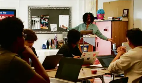  ?? PHOTOS BY MICHAEL JONES/RHODE ISLAND PBS ?? “The students in my classes all got higher grades,” said Deloris Davis Grant, a Central Falls High teacher. “I feel like they were more communicat­ive, looking me straight in the eye, talking with other students.”