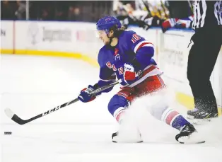  ?? EMILEE CHINN/GETTY IMAGES FILES ?? The MVP stock of centre Artemi Panarin, who tied for third in regular-season scoring with 95 points, has risen now that the Rangers are a playoff team.