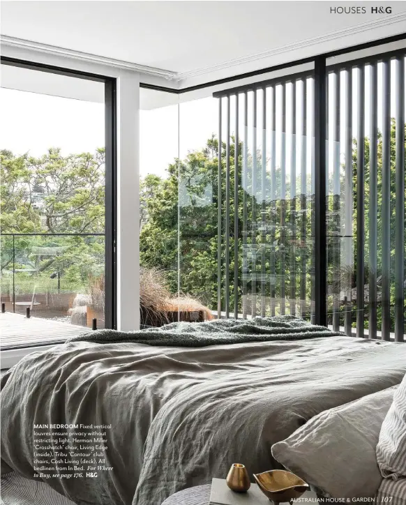  ??  ?? 107
MAIN BEDROOM Fixed vertical louvres ensure privacy without restrictin­g light. Herman Miller ‘Crosshatch’ chair, Living Edge (inside). Tribu ‘Contour’ club chairs, Cosh Living (deck). All bedlinen from In Bed. For Where to Buy, see page 176. #