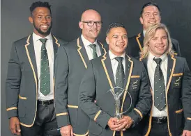  ?? /Ian Gavan/Getty Images for Laureus ?? Help at hand: Siya Kolisi, Jacques Nienaber, Cheslin Kolbe, Francois Louw and Faf de Klerk on a high at the Laureus Awards in February. The Covid-19 pandemic has put a halt to sport, leaving many in financial trouble. World Rugby has launched a relief fund of $100m.