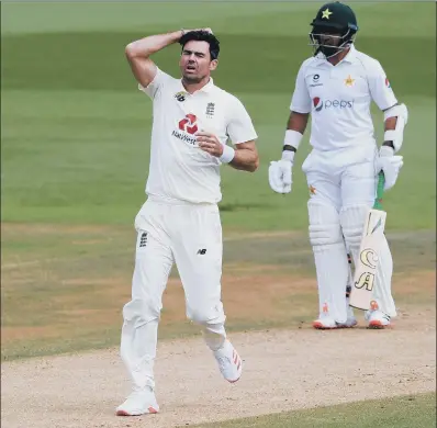  ?? PICTURE: MIKE HEWITT/NMC POOL/PA ?? NOT OUT: England’s James Anderson (left) reacts afterJos Buttler drops a catch to dismiss Pakistan’s Shan Masood.