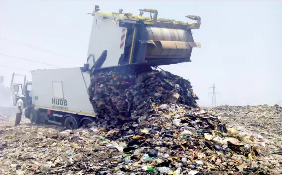  ??  ?? The compactor bought by the Nasarawa State government to manage waste in Karu Local Government Area.