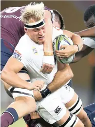  ??  ?? DYLAN Richardson of the Cell C Sharks drives for the line against the Queensland Reds at the Suncorp Stadium, Brisbane, yesterday. | Hollywoodb­ets STEVE HAAG