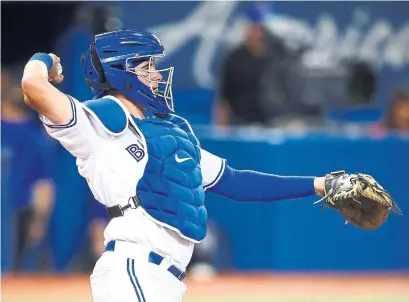  ?? VAUGHN RIDLEY GETTY IMAGES ?? Jays catcher Reese McGuire is an above-average defender but he has surprised at the plate, hitting .301 in 33 big-league games.