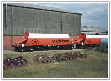  ??  ?? Two new bogie aggregate hoppers, RMC17201 and RMC17202, stand alongside the main erecting shop at Heywood Wagon Works while waiting to be released into traffic on September 10, 1986.