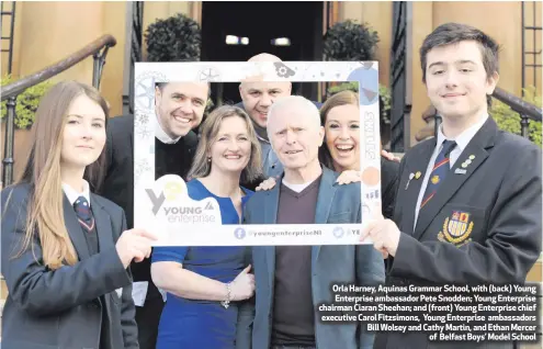  ??  ?? Orla Harney, Aquinas Grammar School, with (back) Young Enterprise ambassador Pete Snodden; Young Enterprise chairman Ciaran Sheehan; and (front) Young Enterprise chief executive Carol Fitzsimons, Young Enterprise ambassador­s Bill Wolsey and Cathy...