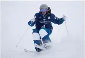  ?? Tribune News Service/getty Images ?? Hannah Soar of the United States takes a run for the Women’s Mogul Finals during the 2021 Intermount­ain Healthcare Freestyle Internatio­nal Ski World Cup at Deer Valley Resort on February 4 in Park City, Utah.