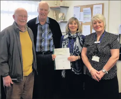  ??  ?? From left Mike Hudson, John Moore, Beverley Brown and Wendy Shaw (practice manager at Burbage Surgery)