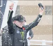  ?? COLIN E. BRALEY — THE ASSOCIATED PRESS ?? Ty Gibbs celebrates after winning the Xfinity Series race Saturday at Kansas Speedway.