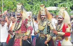  ?? PTI ?? Folk artistes and BJP supporters during the swearingin ceremony BS Yeddyurapp­a in Bengaluru on Thursday.