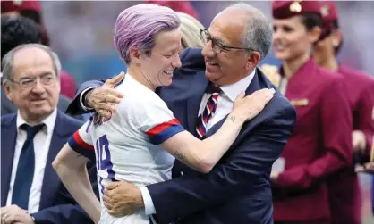  ?? Photograph: Elsa/Getty Images ?? Carlos Cordeiro greets Megan Rapinoe after the final of the 2019 Women’s World Cup. Cordeiro would later mispronoun­ce the player’s name at a victory parade.