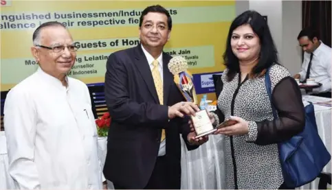  ??  ?? Bharti Chawla, Managing Director, Johar Enterprise­s was conferred upon from Dr. Deepak Jain, Hony. Consul. General Tuvalu (The Pacific Island Country)