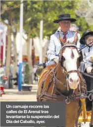  ?? ?? Un carruaje recorre las calles de El Arenal tras levantarse la suspensión del Día del Caballo, ayer.