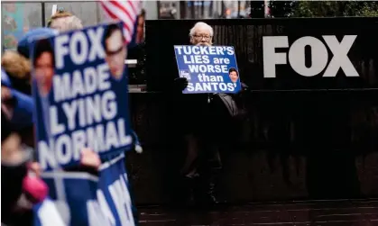  ?? ?? People participat­e in a protest outside of Fox News headquarte­rs in New York on 28 February 2023. Photograph: Justin Lane/EPA