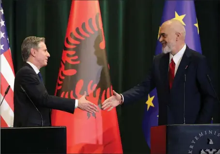  ?? ARMANDO BABANI, POOL — THE ASSOCIATED PRESS ?? U.S. Secretary of State Antony Blinken, left, and Albania’s Prime Minister Edi Rama shake hands after a joint press conference in Tirana, Albania, last week.