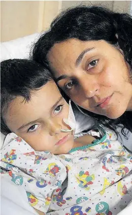  ?? Picture: INS NEWS ?? Critically ill Ashya King, left, with his mother Naghmeh, a Jehovah’s Witness. The boy is missing after being taken from hospital, right