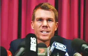  ?? AFP ?? ■ David Warner cries as he speaks at a press conference at the Sydney Cricket Ground in Sydney yesterday, after his return from South Africa.