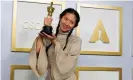  ?? Photograph: Reuters ?? Chloé Zhao with her Best Picture Oscar for Nomadland.