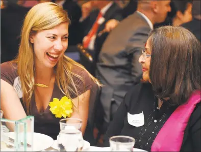  ?? Autumn Driscoll ?? Marcella Kovac talks with Angela DeMello during the Bridgeport Regional Business Council’s Annual Meeting and Luncheon in 2014.