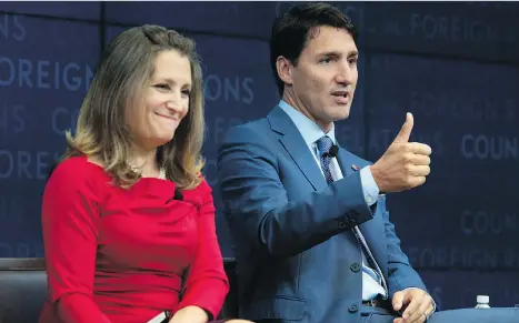  ?? THE CANADIAN PRESS ?? Foreign Affairs Minister Chrystia Freeland and Prime Minister Justin Trudeau attend a panel discussion at the Council on Foreign Relations in New York on Tuesday. On Wednesday, U.S. President Donald Trump expressed unhappines­s with the negotiatin­g style of Canada’s NAFTA team.