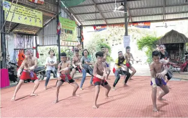  ?? MINISTRY OF CULTURE AND FINE ARTS AND NATIONAL OLYMPIC COMMITTEE OF CAMBODIA ?? Kun Lbokator is a martial art dating back to the first century. It aims to develop the mental and physical strength and discipline of its practition­ers. ©2021