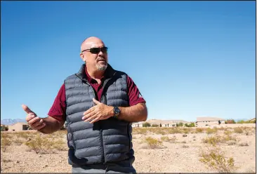  ?? CHRISTOPHE­R DEVARGAS ?? Todd Stratton, owner of Kavison Homes, stands at the planned site of an affordable singlefami­ly home developmen­t in Mountain’s Edge on Oct. 28.